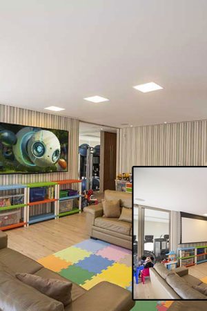 Vista da brinquedoteca, onde foram instaladas duas telas: a TV de 75” pode ser encoberta pela tela elétrica de 106” (veja no detalhe).